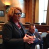 Heitkamp+Tester+DeCoteau: Senator Heidi Heitkamp of North Dakota standing, Senator John Tester and Tami DeCoteau