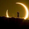 an-onlooker-watches-the-annual-solar-eclipse-in-albuquerque-new-mexico