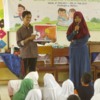 Indonesia Story: Indonesian tsunami survivors listen to the 'Pete's Adventure Story'