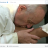 Pope Francis on Holy Thursday kissing refugee's feet